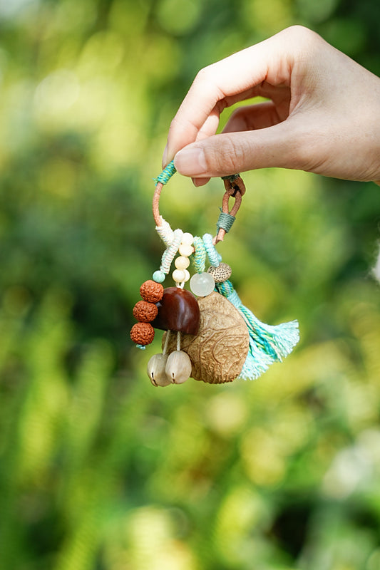 "The Mint Breeze" - Hand-Wrapped Tassel Charm with Rudraksha & Jade-Tone Bead